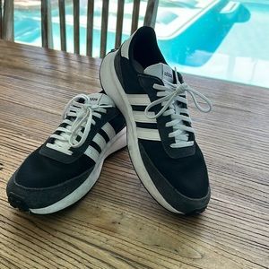 Adidas Black suede and nylon lace up sneakers.